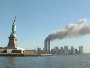 The World Trade Center's Twin Towers burning on 9/11. (Photo credit: National Park Service)
