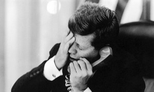 President John F. Kennedy reacts to news of the assassination of Congo's nationalist leader Patrice Lumumba in February 1961. (Photo credit: Jacques Lowe)