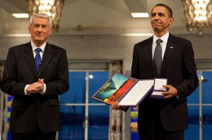 President Barack Obama uncomfortably accepting the Nobel Peace Prize from Committee Chairman Thorbjorn Jagland in Oslo, Norway, Dec. 10, 2009. (White House photo)