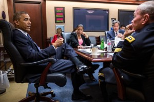 President Barack Obama meets with his national security advisors in the Situation Room of the White House, Aug. 7, 2014.
