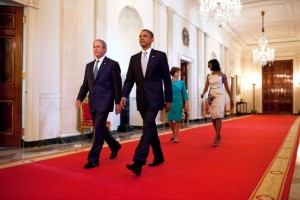 President Barack Obama and former President George W. Bush (with First Lady Michelle Obama and former First Lady Laura Bush) walk to a White House event on May 31, 2012., From ImagesAttr