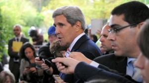 Secretary of State John Kerry addresses reporters in Geneva on Nov. 8, 2013, (Photo credit: State Department)