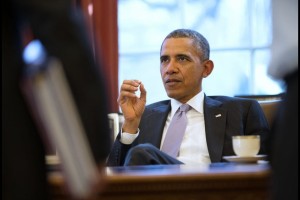 President Barack Obama discusses Ukraine during a meeting with members of his National Security Staff in the Oval Office, From Images