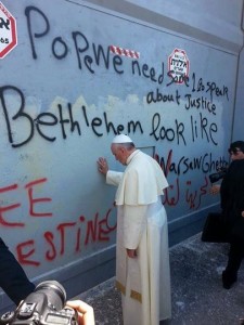 Pope Francis praying a separation wall in Palestine on May 25, 2014. (Photo credit: Pope Francis's Facebook page.). 