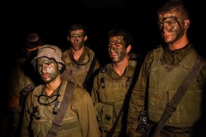 Soldiers from the Israeli Defense Forces prepare for the invasion of Gaza, as the second phase of Operation Protective Edge., From ImagesAttr