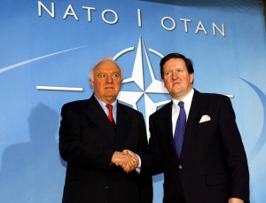 Eduard Shevardnadze, as president of Georgia in 2002, being welcomed to NATO by NATO Secretary General, Lord Robertson. (Credit: NATO photo)