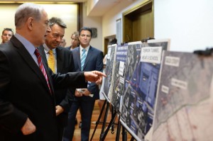 Israeli Prime Minister Benjamin Netanyahu shows off photos that he claims justified the bombardment of Gaza., From ImagesAttr