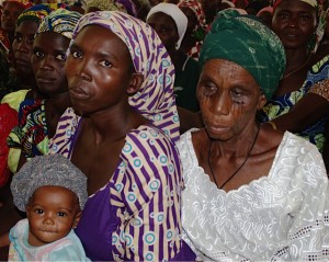 Nigerian women and children wait for relief supplies from a Catholic Church in Yola, Nigeria. (Photo by Don North)