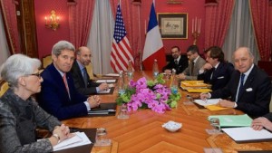 Secretary of State John Kerry meets with his diplomatic team and their French counterparts during negotiations with Iran over its nuclear program in Switzerland on March 28, 2015. (State Department photo)