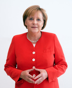 German Chancellor Angela Merkel with her hands in the characteristic Merkel-Raute position. (Photo from Wikipedia)
