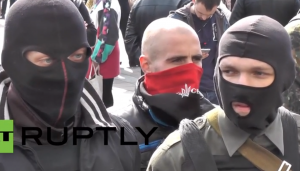 Far-right militia members demonstrating outside Ukrainian parliament in Kiev. (Screen shot from RT video via YouTube video)