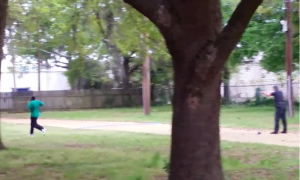 A screen-shot from a video showing Walter Scott being shot in the back by a North Charleston, South Carolina, police officer Michael Slager on April 4, 2015. (Video via the New York Times.)