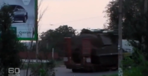 A screen shot from a video of a suspected BUK missile battery traveling on a road in eastern Ukraine after the July 17, 2014 shoot-down of Malaysia Airlines Flight 17. (As shown in Australia’s “60 Minutes” program.)