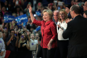 Former Secretary of State Hillary Clinton with former U.S. Congresswoman Gabrielle Giffords and astronaut Mark Kelly speaking with supporters at a campaign rally at Carl Hayden High School in Phoenix, Arizona. March 21, 2016. (Photo by Gage Skidmore)