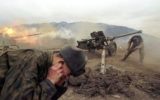 Russian artillery shells Chechen positions near the village of Duba-Yurt, January 2000. (Wikimedia)