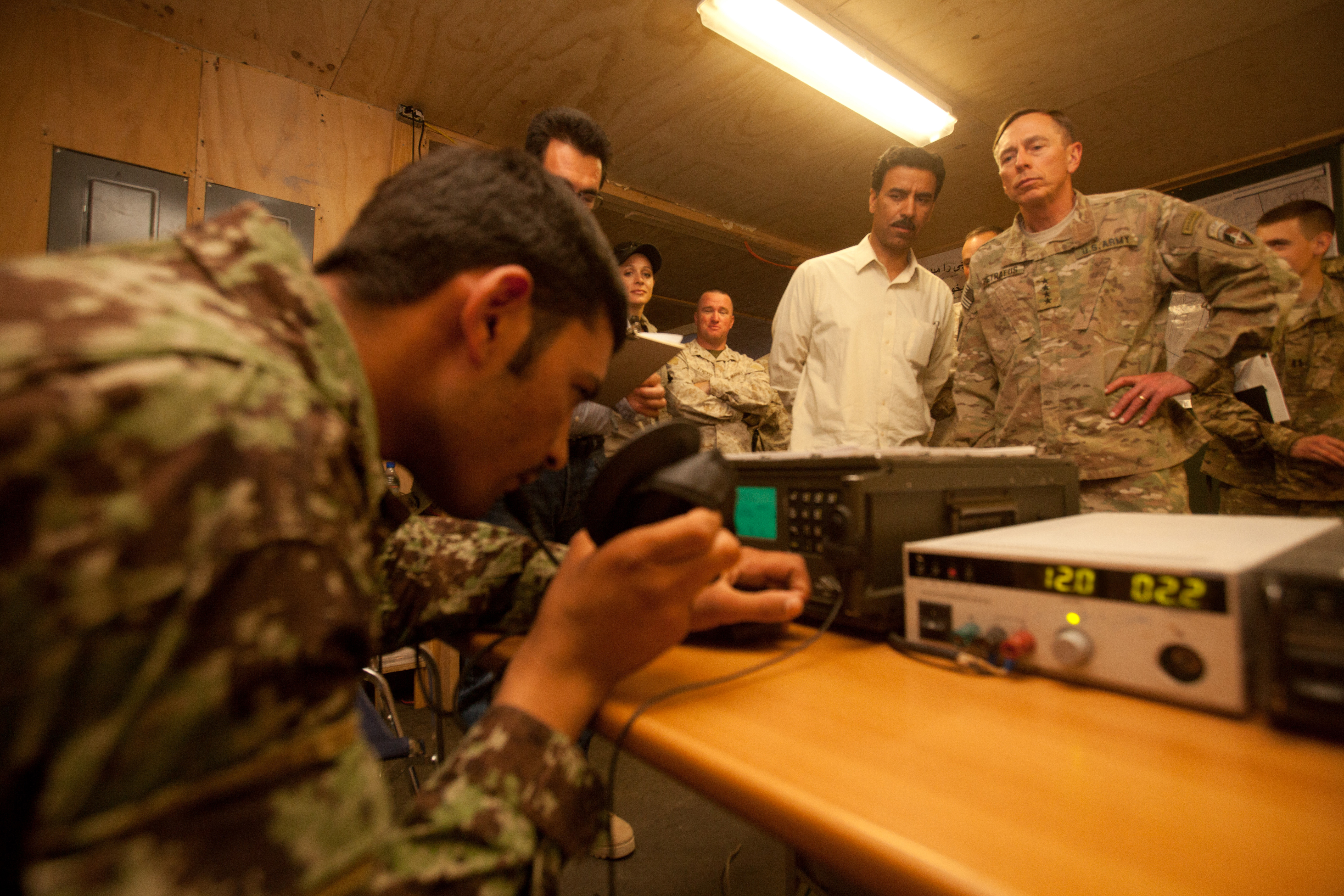Petraeus evaluates an Afghan National Army soldier at Camp Dwyer in Southern Helmand province, May 2011. (Sgt. Jesse Stence)