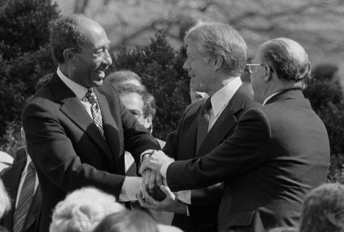 Sadat, Carter and Israel's Menachem Begin at the White House in 1979 after signing Egyptian–Israeli Peace Treaty. (Wikimedia)
