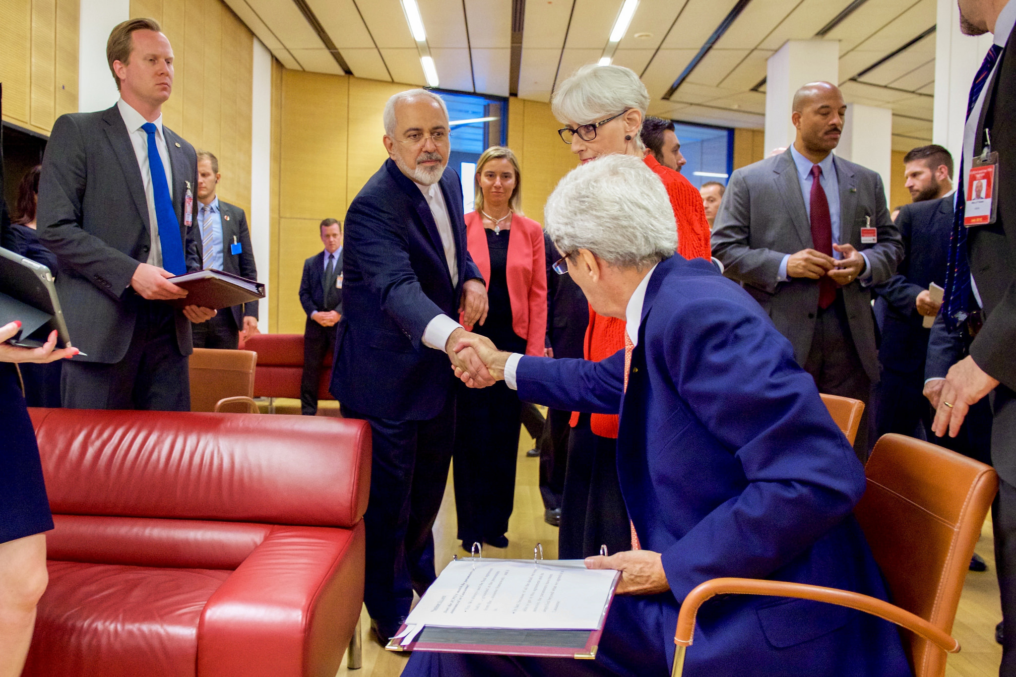 Secretary Kerry shakes hands with and bids goodbye to Iranian Foreign Minister Zarif at the Austria Center in Vienna, July 14, 2015, after Zarif read a declaration of the nuclear agreement in his native Farsi. (State Department)