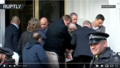 Police expelling Assange from embassy, April 11, 2018. (YouTube)